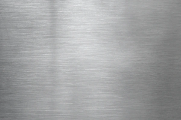 Brushed-and-polished-mechanical-metal-finishes-showing-directional-surface-texture-and-controlled-visual-character