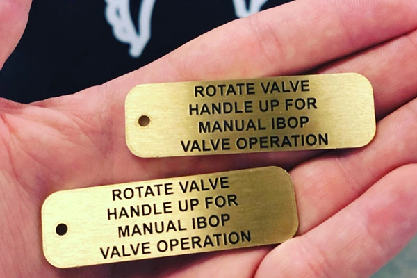 Copper-nameplate-installed-on-finished-product-in-controlled-indoor-environment