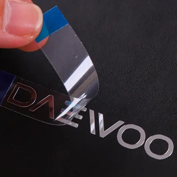 Decorative-nickel-branding-element-featuring-fine-detail-and-precise-metal-finishing