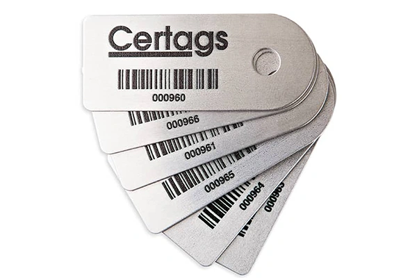 Metal-asset-label-used-for-equipment-identification,-maintenance-tracking,-and-compliance-marking