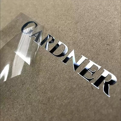 Nickel metal stickers used for branding on automotive parts and accessories, offering a durable and high-end look.