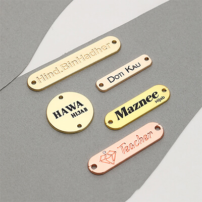 Brushed-aluminum-logo-plate-with-adhesive-backing