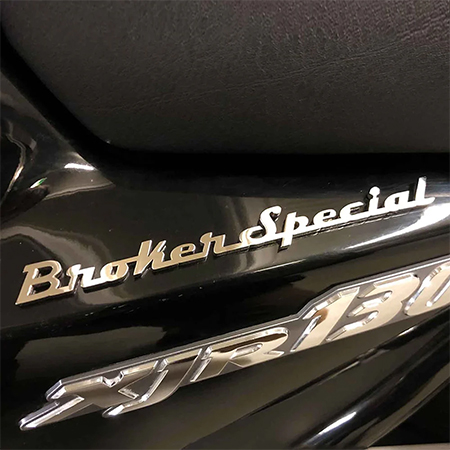 Custom-chrome-metal-emblem-on-a-car-trunk