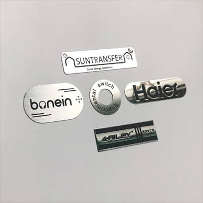 Glossy-metal-logo-sticker-for-automotive-dashboard