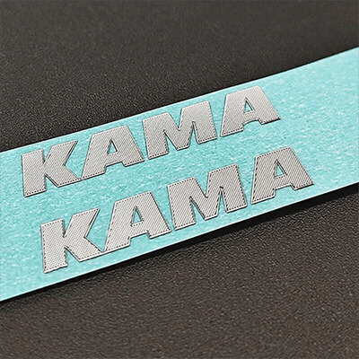 Metal-stickers-with-custom-shapes-and-adhesive-backing-for-products