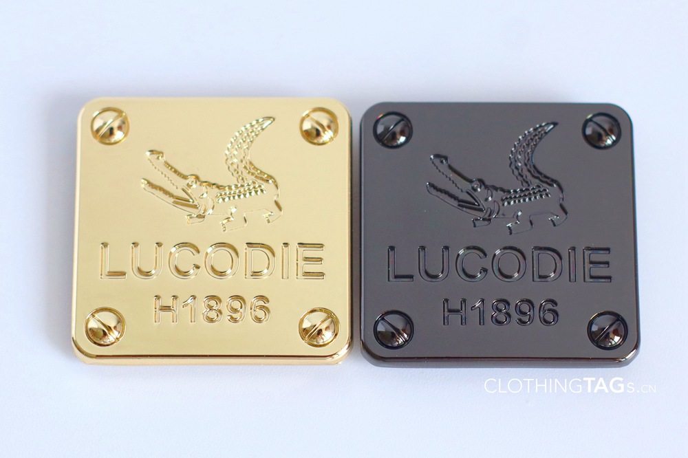 custom adhesive metal label on industrial equipment