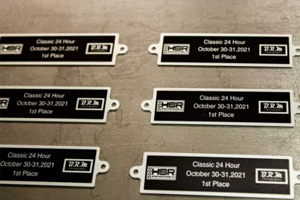 Custom metal labels with logo and product information