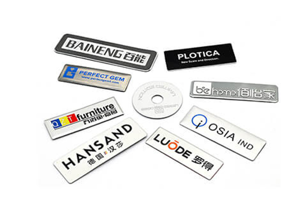 Custom-metal-logo-plates-for-product-branding-and-equipment-labeling