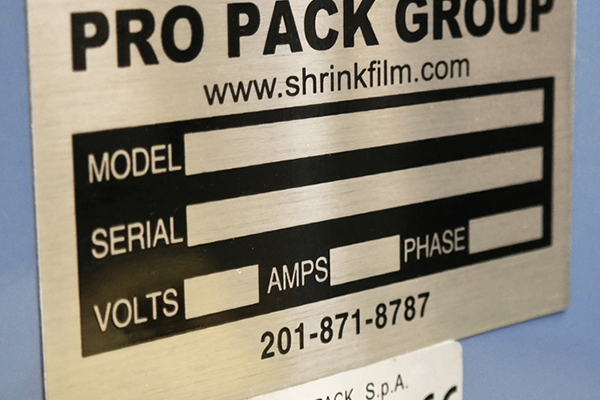 Durable-engraved-metal-nameplate-mounted-on-industrial-equipment