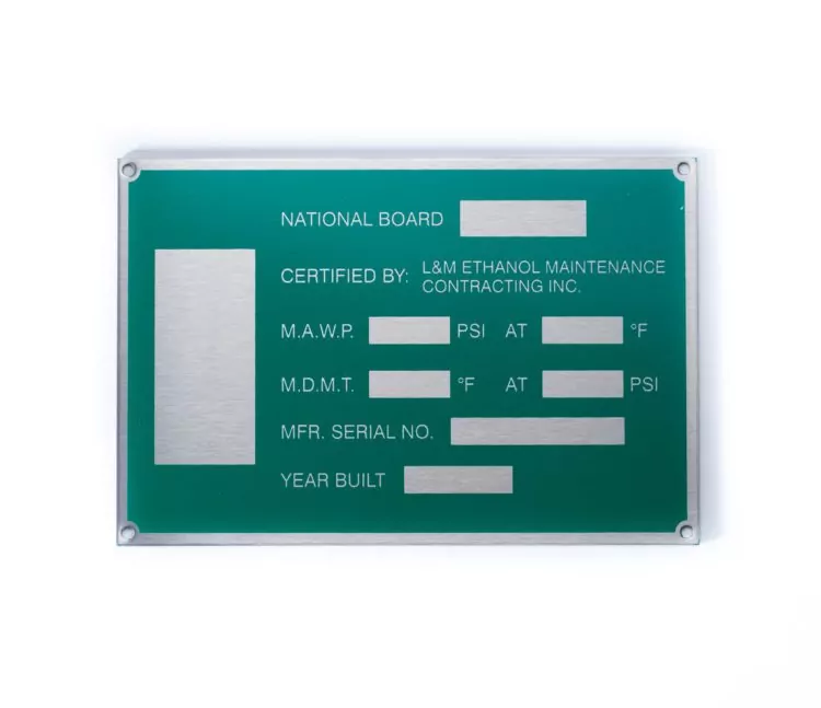 Adhesive-backed aluminum equipment label on painted surface - Himgo