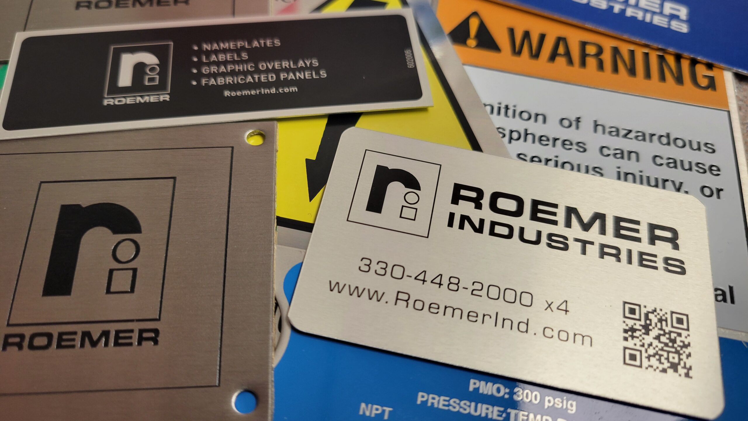 Industrial metal label mounting options with adhesive backing holes screws rivets rounded corners and custom shapes